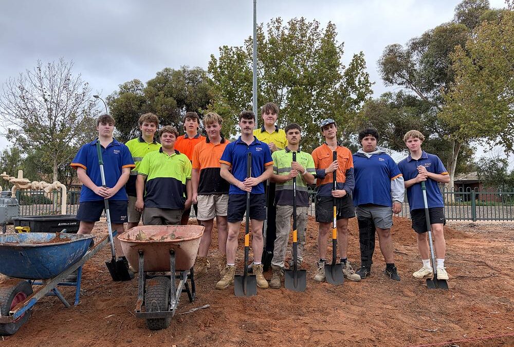 Caravan, lawnmower and retaining wall: ACEE students embrace practical learning